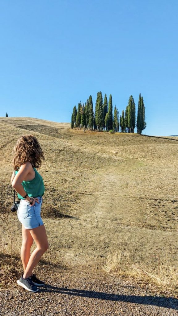 Me looking at Cipressi of San Quirico d'Orcia